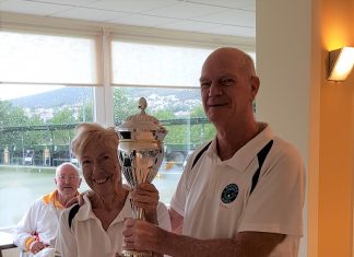 The picture shows Dennis and Chris with the Angel Poveda Trophy.